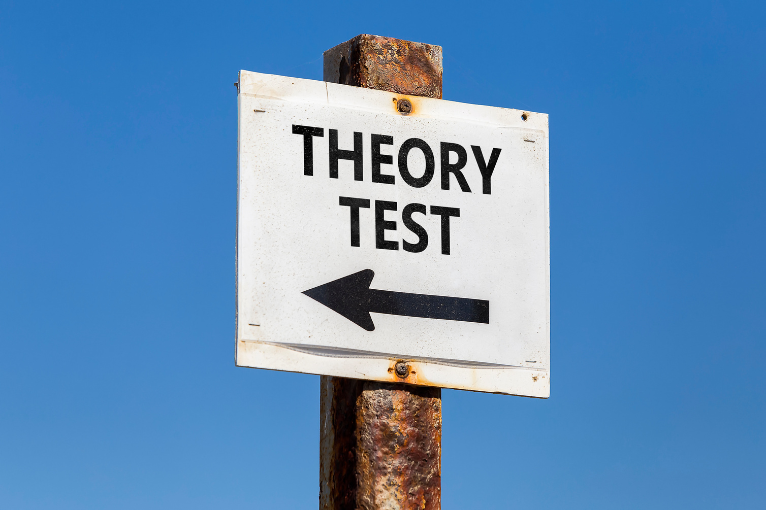 Theory test word and arrow signpost